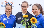 So sehen Sieger aus: das erfolgreiche Triathlon-Trio aus Elmshorn. (Foto: EMTV)