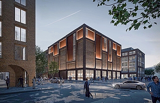 So stellen sich die Planer die Zukunft der Knechtschen Hallen vor: In der Mitte ist das künftige Parkhaus (Halle B) zu sehen. Davor führt die Planstraße B nach links Richtung Berliner Straße. Rechts hinten steht die Halle A an der Schloßstraße. Vorn links ragt eine Ecke des Quartiers am Buttermarkt in das Bild hinein. (Visualisierung: Schneider + Sendelbach Architektengesellschaft mbH)