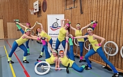 Mit der Aerobic-Kür „Enorm in Form“ brachten die Einradfahrer/-innen vom Elmshorner MTV ordentlich Stimmung in die Halle Erich Kästner Gemeinschaftsschule Elmshorn. (Foto: Stefanie Weise)